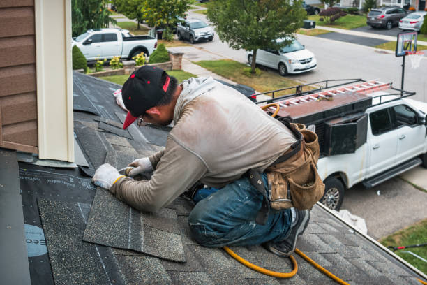 Professional Flat Roof Repair technician working in Uxbridge, MA